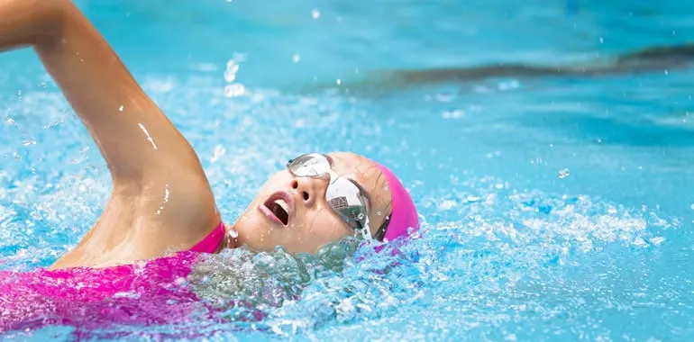 Swimmer doing laps in a pool