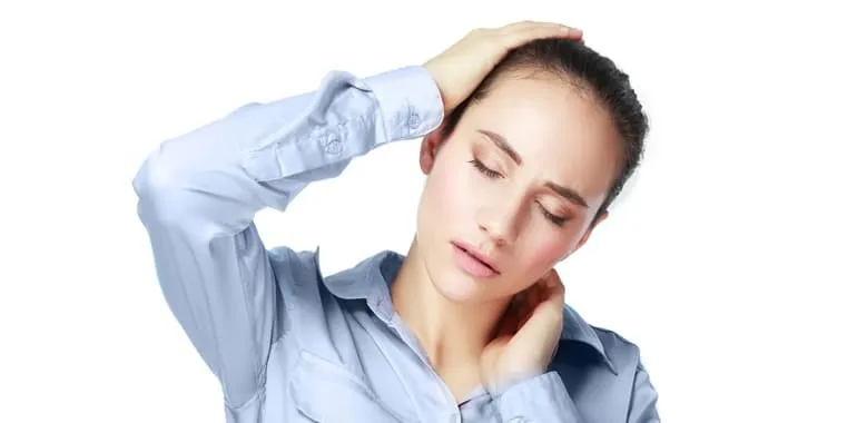 Woman holding her neck in pain